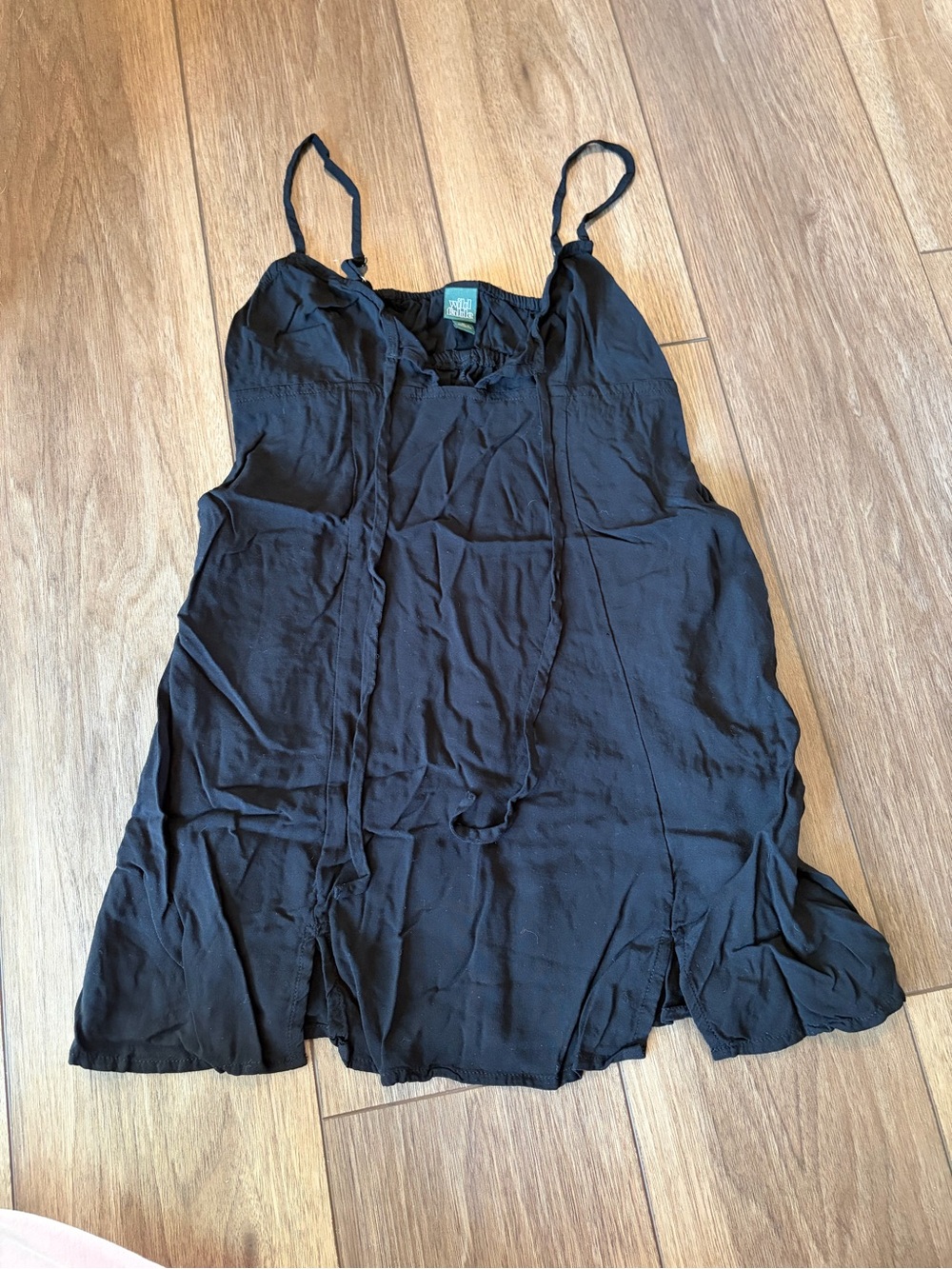 Wild Fable black camisole with adjustable straps and ruffle details